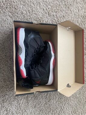 Air Jordan 11 Retro Bred GS Black Red            Size 4.5Y/6W 
With Original Box